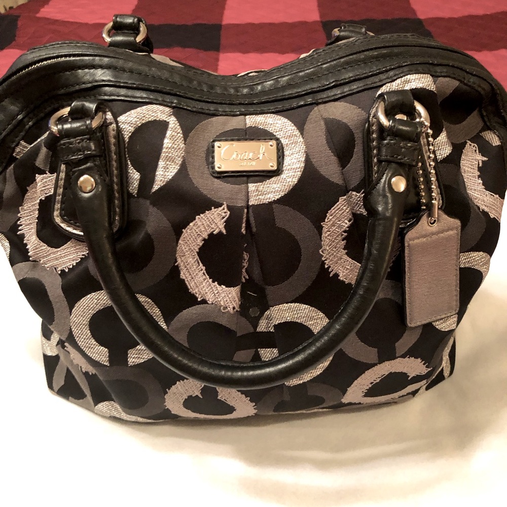 Coach Op Art satchel with silver and gray signature C’s.